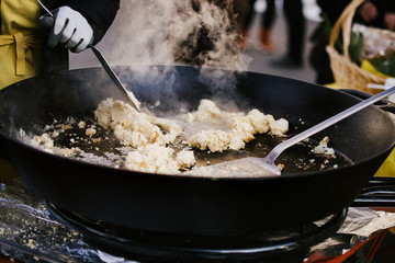 Ribelmais or corn mash swiss traditional food  at public open markets by cold weather