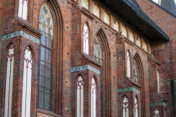 Obraz premium Medieval Gothic Windows in a Brick Wall