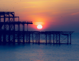 sunset over the old pier