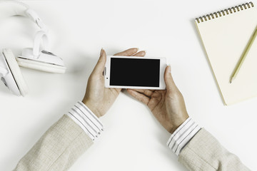 Businesswoman using her smartphone
