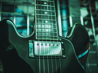 close up shot of electric guitar strings 