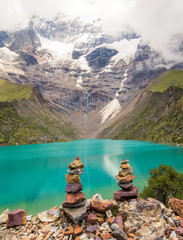 Stacked stones on Humantay lake in Peru