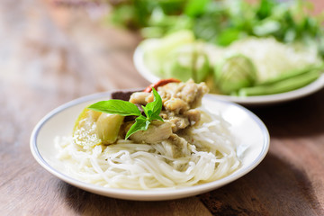 Thai food, rice vermicelli noodles with green curry chicken