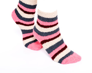 Multicolor women's fuzzy ankle socks with stripes isolated on white background