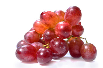 Red grapes on white