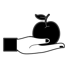 Hand holding an apple