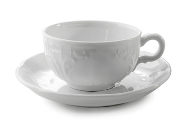 porcelain tea  cup and saucer close-up isolated on white background

