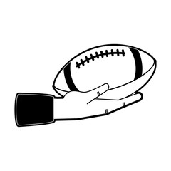 Hand holding American football ball