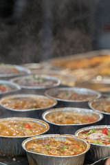 Chinese Street Food Close Up of Stewed Brain with Steam Rising Chengdu China - Selective Focus Vertical