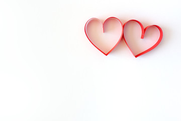 paper hearts  from red paper on a white background