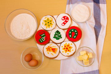 Flour, eggs, sugar, butter and baked christmas cookies