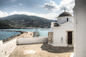 Fototapeta na wymiar Historic church in the center of Skopelos town on Skopelos island in Greece 