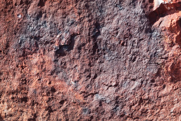 Surface of sandstone covered by iron oxides