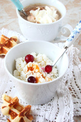 Cottage cheese for Breakfast with berry jam and cranberries