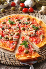 Pizza with tomatoes, mushrooms, black olives, Parmesan cheese, capers