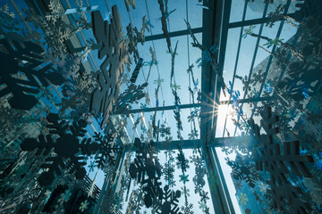 Hanging snowflakes mobile under sunshine light