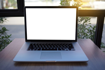 Fototapeta premium Workspace background new project on laptop computer with blank copy space screen for your advertising text message Laptop with blank screen on table.