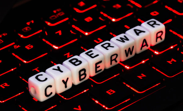 Cyberwar catchword on keyboard