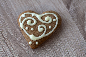 Christmas homemade gingerbread cookies on a wooden table