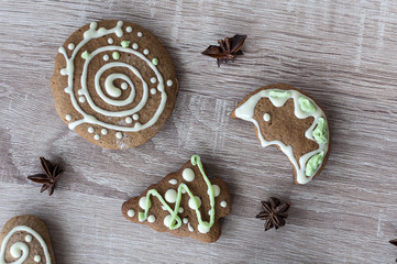 Christmas homemade gingerbread cookies on a wooden table