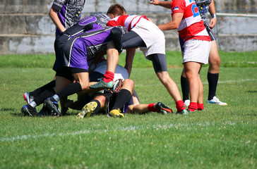 Rugby players play the game