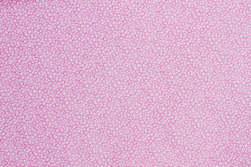 Cotton fabric with pink pattern. Soft texture and cute appearance. Textile and clothing.