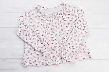 Beautiful pajama top with ruffle collar. White cotton fabric with fine flower pattern. Girls sleepwear collection.