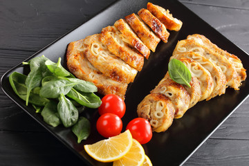 stuffed chicken boneless drumsticks on plate