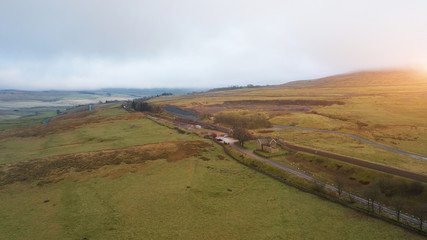 Naklejka premium Aerial View of Train passing over the Ribblehead Viaduct Settle-Carlisle Railway, North Yorkshire