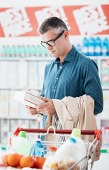 Man reading food labels