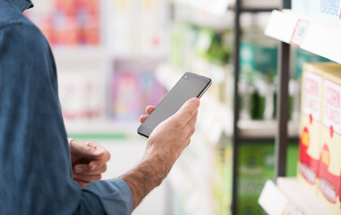 Man shopping and using mobile apps
