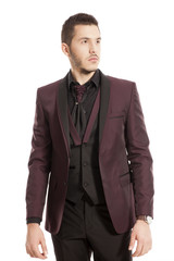 young handsome man in a suit on white background