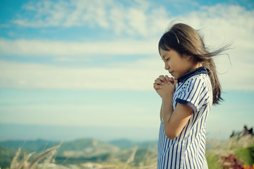 Girls prayer to God  © beerphotographer