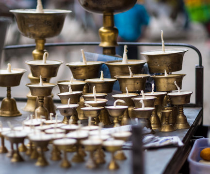 Candle holders made of brass on sale on the street market