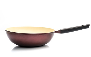 Empty new wok isolated on white background. Chinese frying pan