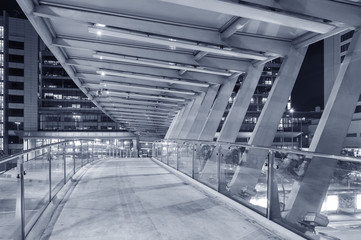 Empty pedestrian transition over busy street in urban city