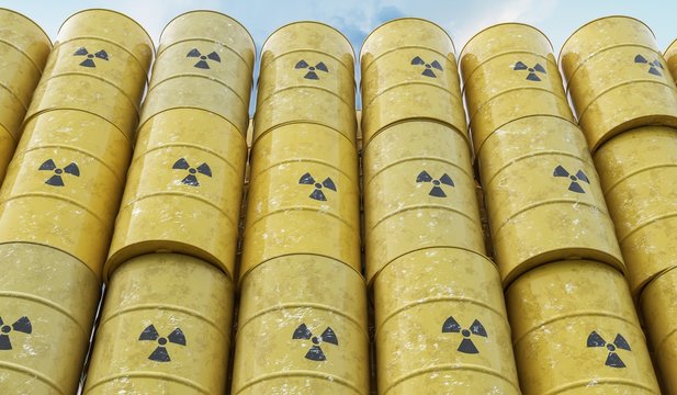 Many yellow barrels with nuclear radioactive waste. 3D rendered illustration.