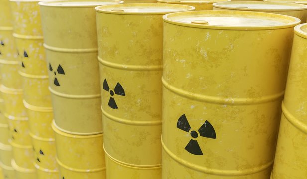 3D rendered illustration of many radioactive barrels. Nuclear waste dumping concept.