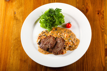 Beef with mushroom sauce
