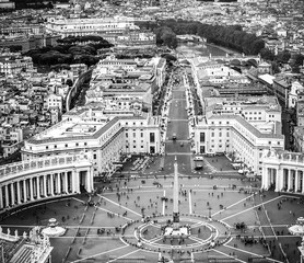 Famous Saint Peter's Square in Vatican and aerial view of the city, Rome, Italy. Photo in black and white