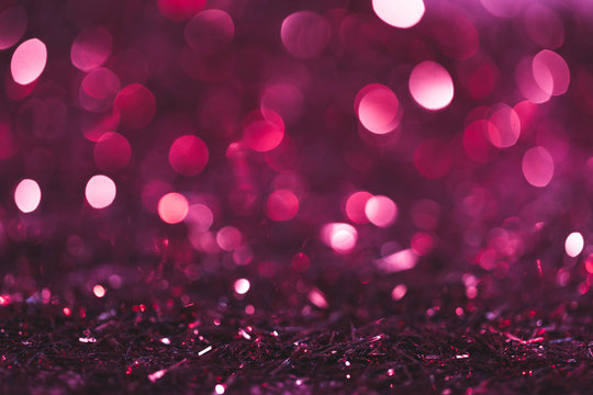 Christmas Background With Pink And Purple Shiny Confetti