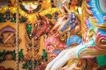 Carousel, merry go round, at Christmas funfair winter wonderland