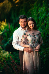 Beautiful young couple on a nature background