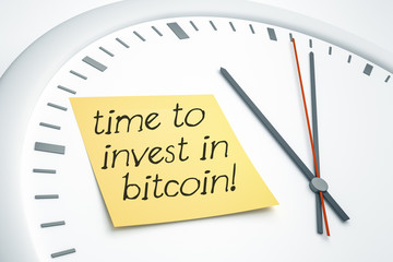clock with sticky note time to invest in bitcoin