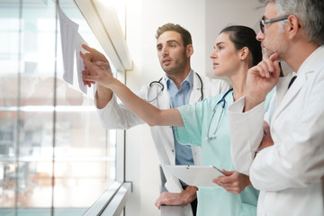 Medical team meeting to talk about medical reports
