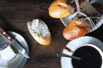 Freshly baked French baguette on a wooden table