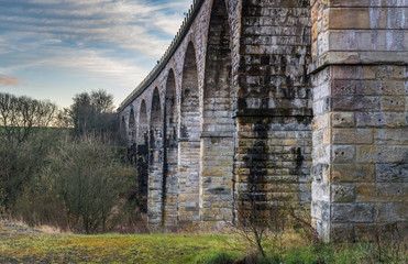 Fototapeta na wymiar Old Railway Viaduct at Sunset