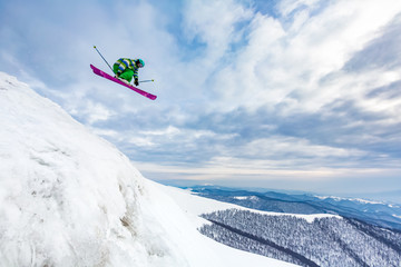 Naklejka na ściany i meble Good skiing in the snowy mountains.