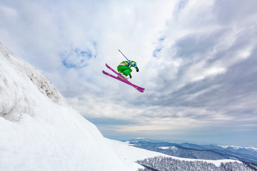 Naklejka na ściany i meble Good skiing in the snowy mountains.