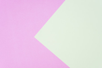 Flat lay, pink and green paper pastel colors for texture background.